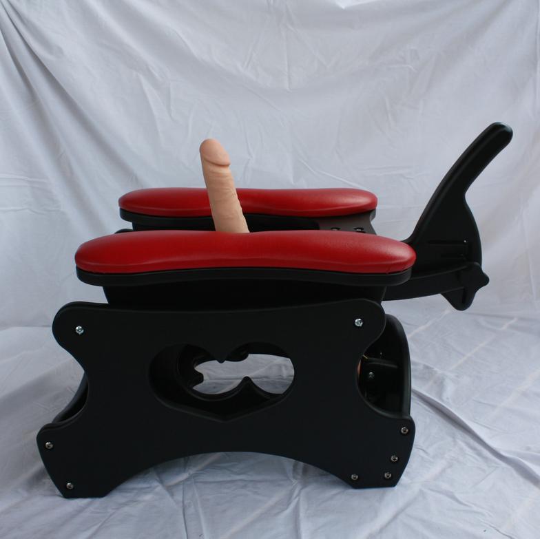 Rocking chair with dildo. 