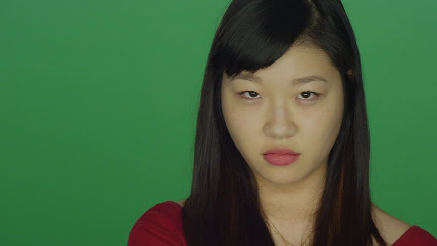 Asian girl staring