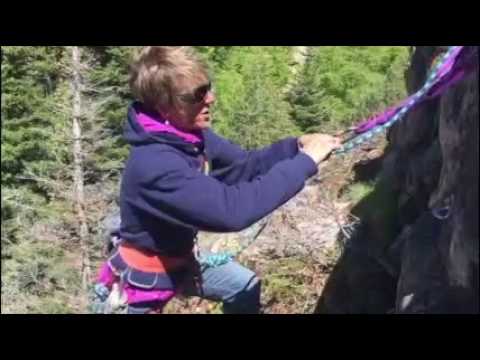 Rock climbing women pissing