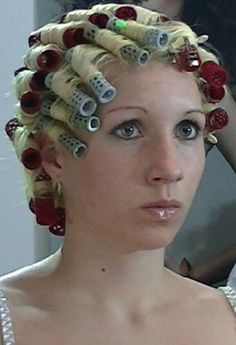 Transsexual woman curlers pierced ears